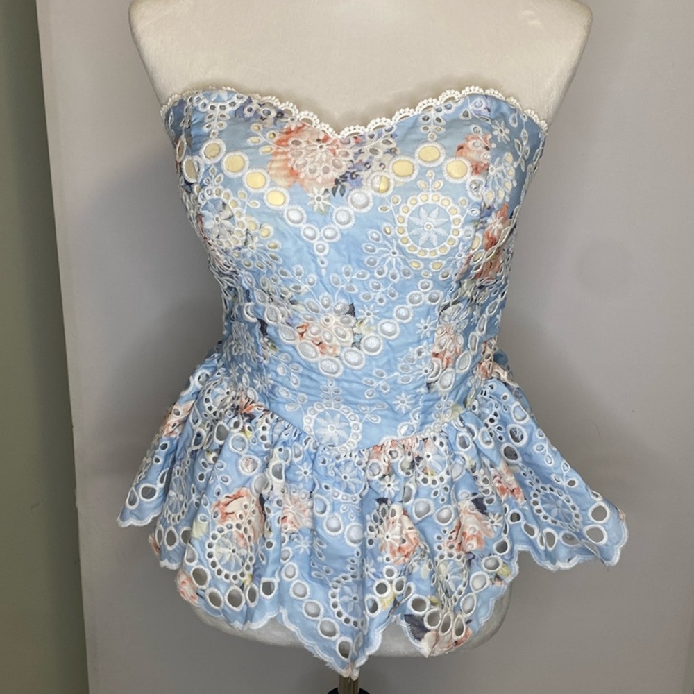 Lacy peplum strapless top